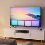 TV streaming device and remote on a white media console under a large TV in a cozy American living room
